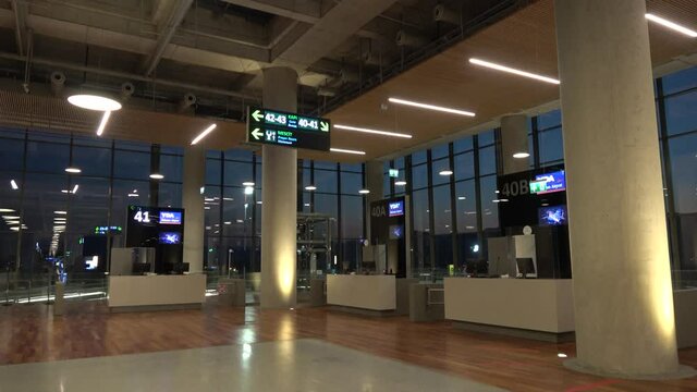 Dalaman Airport, Antalya, Turkey - 2nd of September 2020: 4K Viewing closed gates in the night airport

