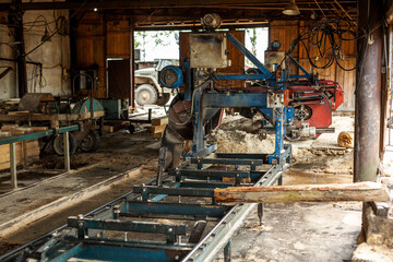 Fototapeta na wymiar woodworking machine in a barn