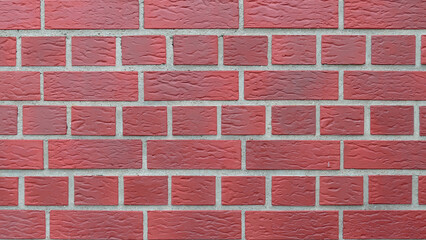 Red clinker bricks from a wall, brick facade, texture wallpaper