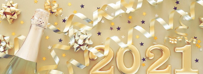 Happy new year 2021 decorations in gold colors on gold background. Banner.Top view. Christmas card.