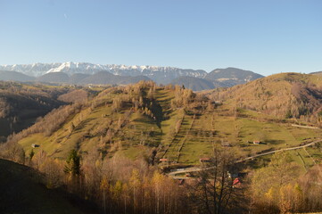 Fototapeta premium Hiking in the misty and dramatic Carpathian Mountain range in Romania, Eastern Europe