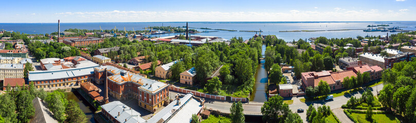 Fototapeta na wymiar An amazing engineering structure from the time of Emperor Peter. Cross-channel with docks and Petrovsky dock from above. Kronshtadt, Saint Petersburg