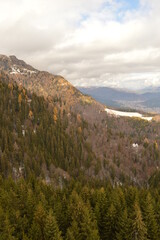 Hiking in the dramatic misty Carpathian Mountain Range in Romania, Eastern Europe