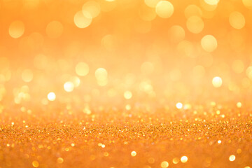 Beautiful gold abstract background with bokeh defocused lights