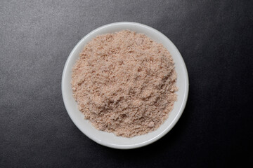 himalyan salt in bowl on dark background, sodium diet