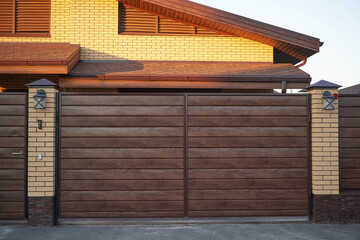 Modern brown metal and PVC plastic gates