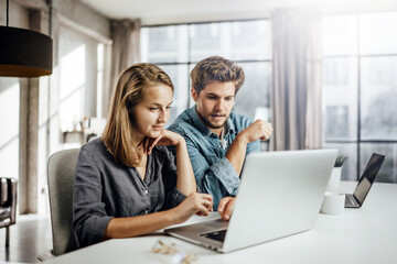 Group of young people working or studying together. Hipster team in coworking. Young modern...
