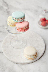 French cake macarons on a marble background