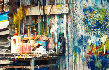street artist's corner, lots of paints, colors