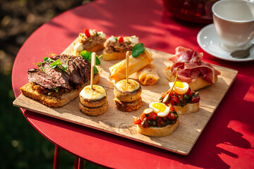 Assorted spanish tapas with different toppings
