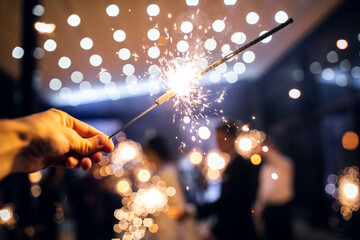  sparkler burns in hand.happy new year 2022