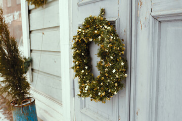 Christmas wreath on an antique front door, Finland
