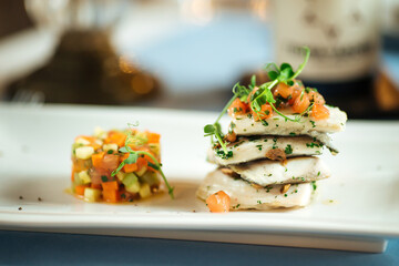 Spanish dish basque dorada with vegetable tartare
