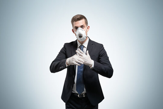 Businessman in protective mask and gloves