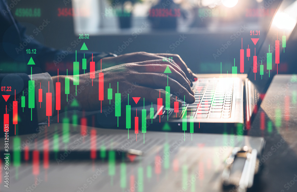 Poster businessman using laptop for analyzing data stock market. . technical price candlestick chart graph 