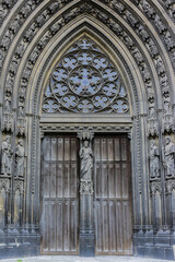 Saints Statues at central portal of western facade of Saint-Ouen-de-Rouen. Rouen Saint-Ouen Abbey Church (Abbatiale Saint-Ouen, 1318 - 1537) - Gothic Roman Catholic church in Rouen, Normandy, France.