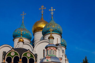 Fototapeta na wymiar Domes of the Assumption Cathedral of the Trinity-Sergius Lavra (Sergiev Posad, Moscow region, Russia)