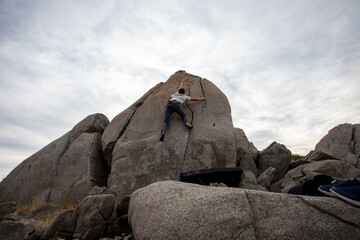 Fototapeta na wymiar person rock climbing