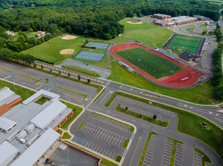 During the quarantine coronavirus, school closed of empty stadium with basketball field and training ground in park