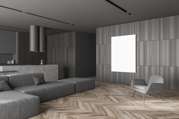 Stylish gray and wooden living room corner with armchair and poster
