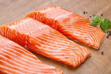 Three pieces of fresh raw salmon