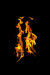 Fire flames on black background, isolated