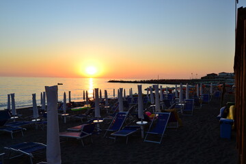 sunset on the beach an pier Livorno