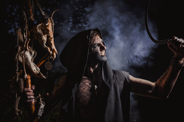 Fototapeta premium Kodun with marks on the body in the forest