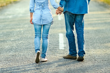  couple in love on road are walking