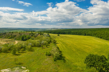 Aerial view from drone of beautiful fresh green countryside and at summer