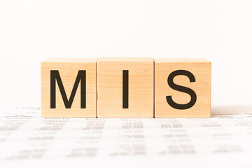 Word mis. Wooden small cubes with letters isolated on white background with copy space available.Business concept