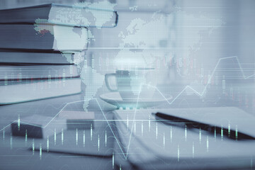 Double exposure of financial chart drawing and desktop with coffee and items on table background. Concept of forex market trading