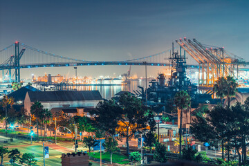 Night View of Port of Los Angeles, Vincent Thomas Bridge, Battleship Iowa, Long Beach, California, taking from San Pedro. - obrazy, fototapety, plakaty