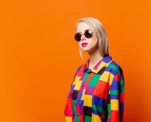 Style girl in 90s clothes and sunglasses