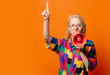Style blonde in 90s clothes and rainbow glasses with megaphone - obrazy, fototapety, plakaty