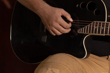 musician playing the guitar
