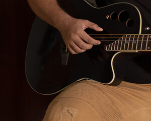 musician playing the guitar