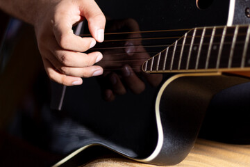 musician playing the guitar