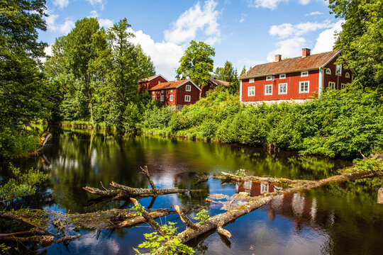 A Red Swedish Traditional House  On The Countryside In Sweden