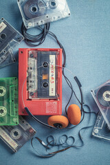 Retro audio cassette with headphones and player