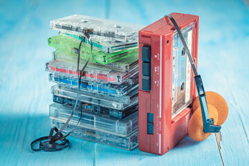 Old cassette tape with player and headphones
