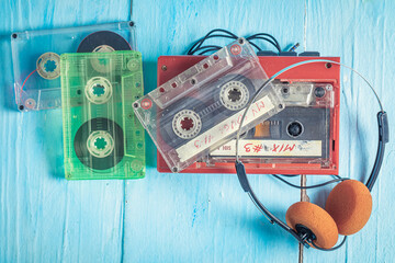 Classic cassette tape with headphones and player