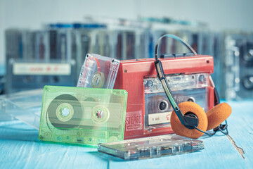 Retro cassette tape with player and headphones