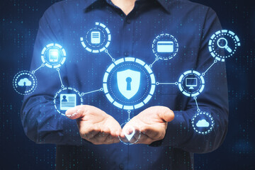 Businesswoman holding digital antivirus hologram.