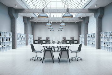 Luxury coworking office in loft style and table with computers.