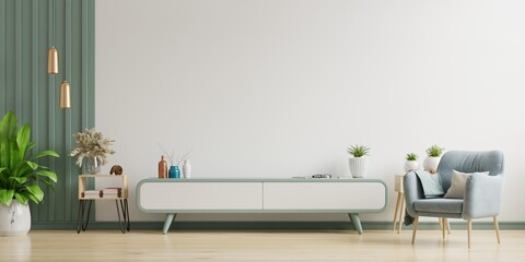 Cabinet TV in modern living room,Interior of a bright living room with armchair on empty white wall background.