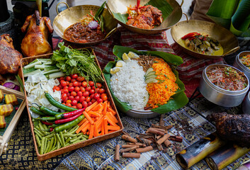 Asian Food dishes; Curry and vegetables ( Tomatoes, Carrots, rice...) 