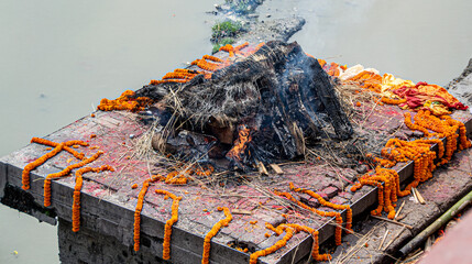 Kathmandu, Nepal Funeral,  Remainings of a cremated body at  Pashupatinath Temple in Kathmandu....