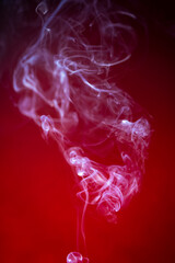 Smoke on the red background