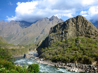 The flowing Urumbamba River of Peru, as seen from a train between Machu Picchu and Cusco